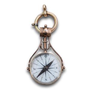 A Swivelling Gold Fob Seal With A Compass. English, Mid 19th Century.