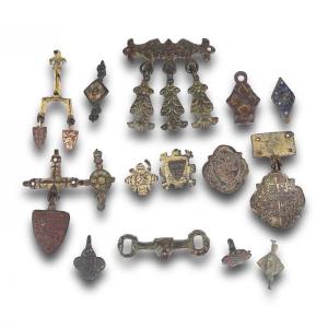 Fifteen Roman And Medieval Bronze, Gilt And Enamelled Horse Harness Pendants.