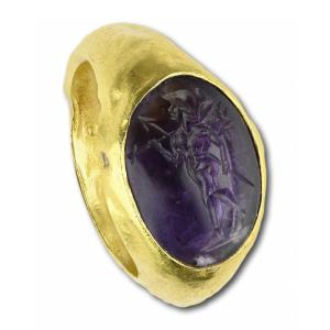 Ancient Gold Ring With An Amethyst Intaglio Of Mars. Roman, 2nd Century A.d.