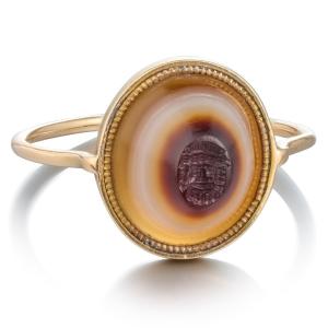 Georgian Gold Ring With An Ancient Banded Agate Intaglio Of A Bacchic Mask.
