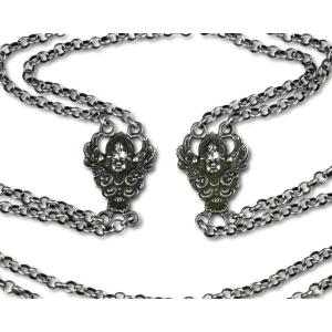 Silver Double Long Chain Set With Putto Heads. Italian, 17th Century.
