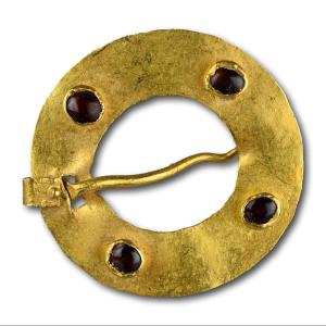 Medieval Gold Ring Brooch Set With Garnets.  western Europe, Circa. 1200-1500.