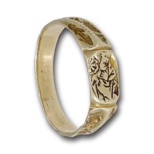 Bague iconographique en or gravée de Sainte Catherine. Angleterre, XVe siècle. 
