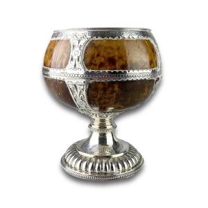 A Large Silver Mounted Coconut Goblet. Colonial, Mid-19th Century.