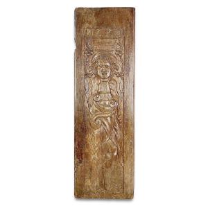 A Large Oak Relief Of A Grotesque Figure. French, Dated 1660.