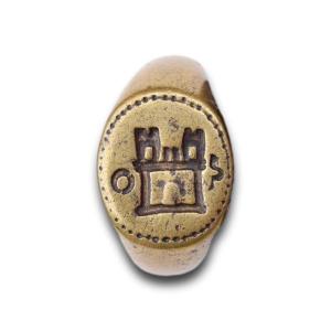 Bronze Merchants Ring With A Castle. Continental, 16th Century.