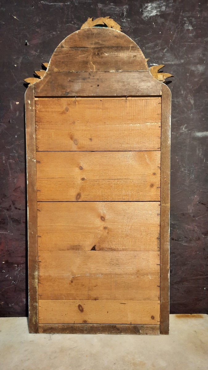 Trumeau de style Louis XVI en bois sculpté doré -photo-1