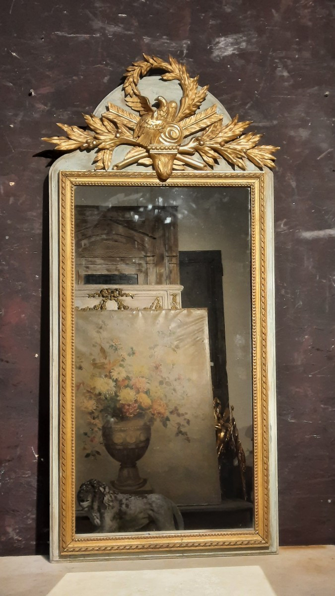 Trumeau de style Louis XVI en bois sculpté doré 