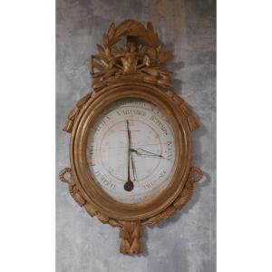 Baromètre en bois sculpté doré d'époque Louis XVI 