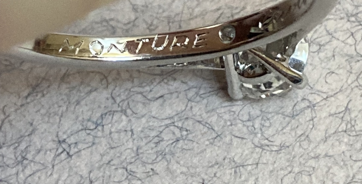 Cartier - Solitaire With Cartier Gold And Platinum Setting -photo-1