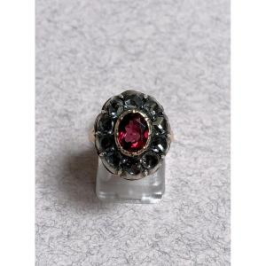 Bague or, argent, diamants et grenat 