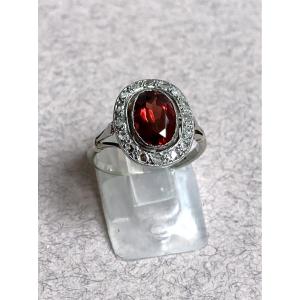 White Gold Ring With Garnet And Diamonds