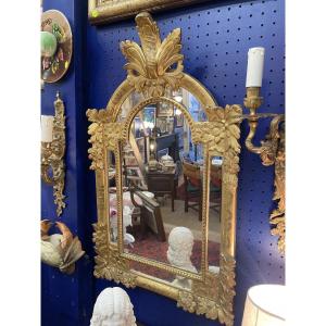 Miroir à parcloses en bois doré 