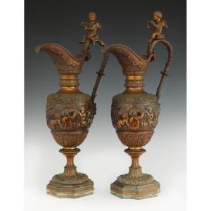 PAIRE D'AIGUIÈRES STYLE RENAISSANCE EN BRONZE DORÉ ET PATINÉ, NAPOLÉON III