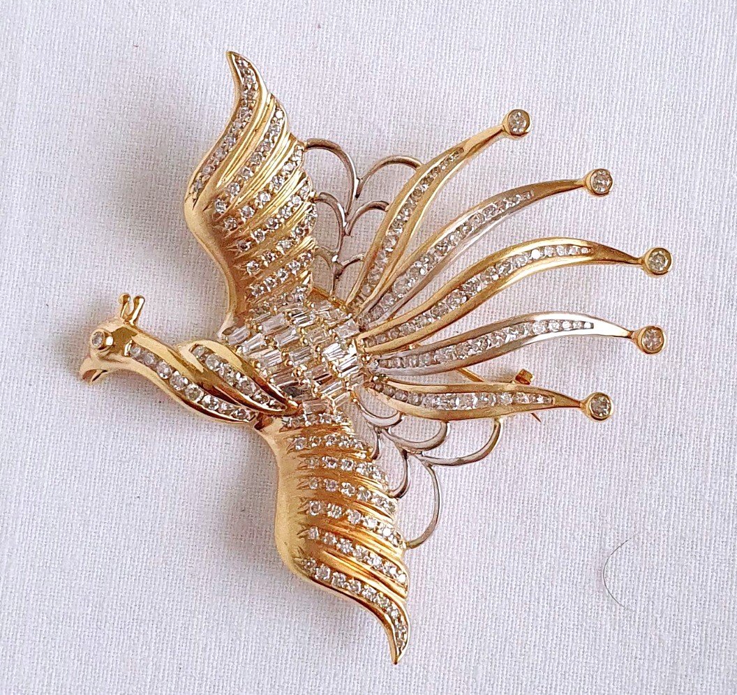 BROCHE  " OISEAU DE PARADIS" OR JAUNE 750°/°° ET DIAMANTS 