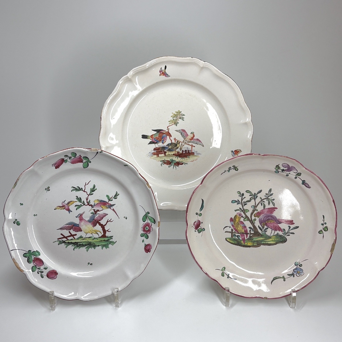 Two Earthenware Plates And A Platter Decorated With Birds - 18th Century