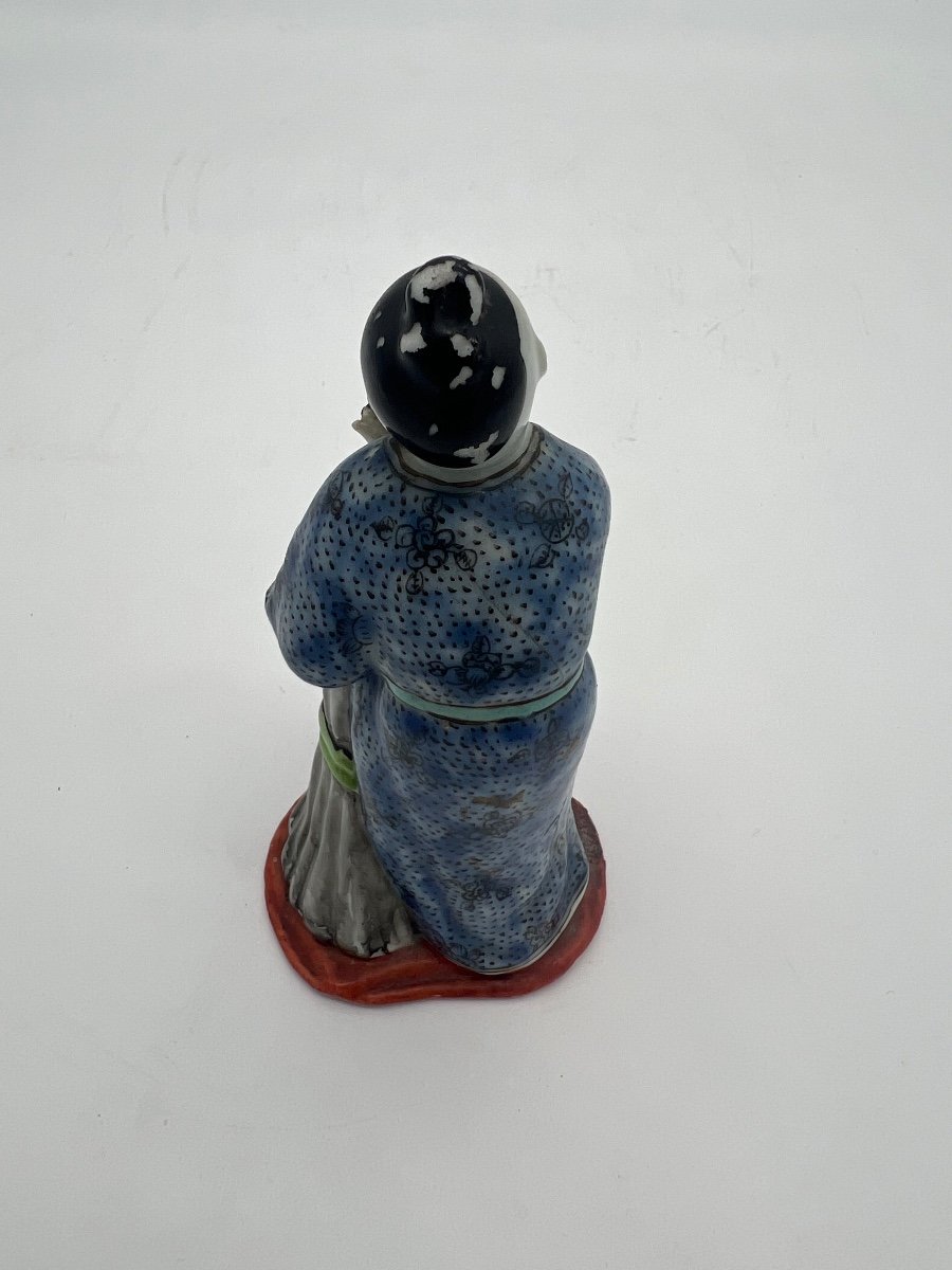 Small Polychrome Porcelain Statue. -photo-3