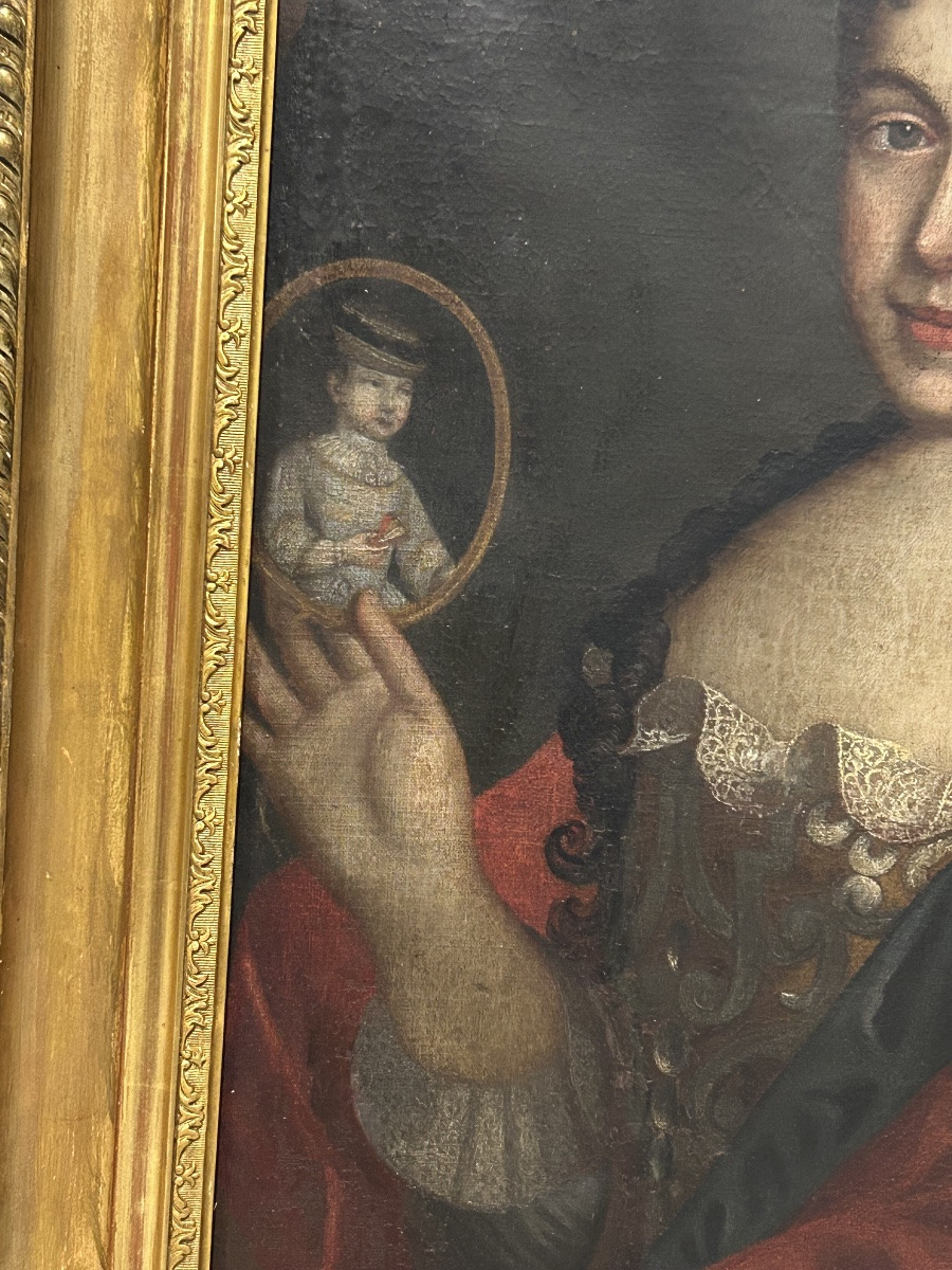 Portrait Of A Woman From The 17th Century Presenting A Miniature Of Her Child -photo-1