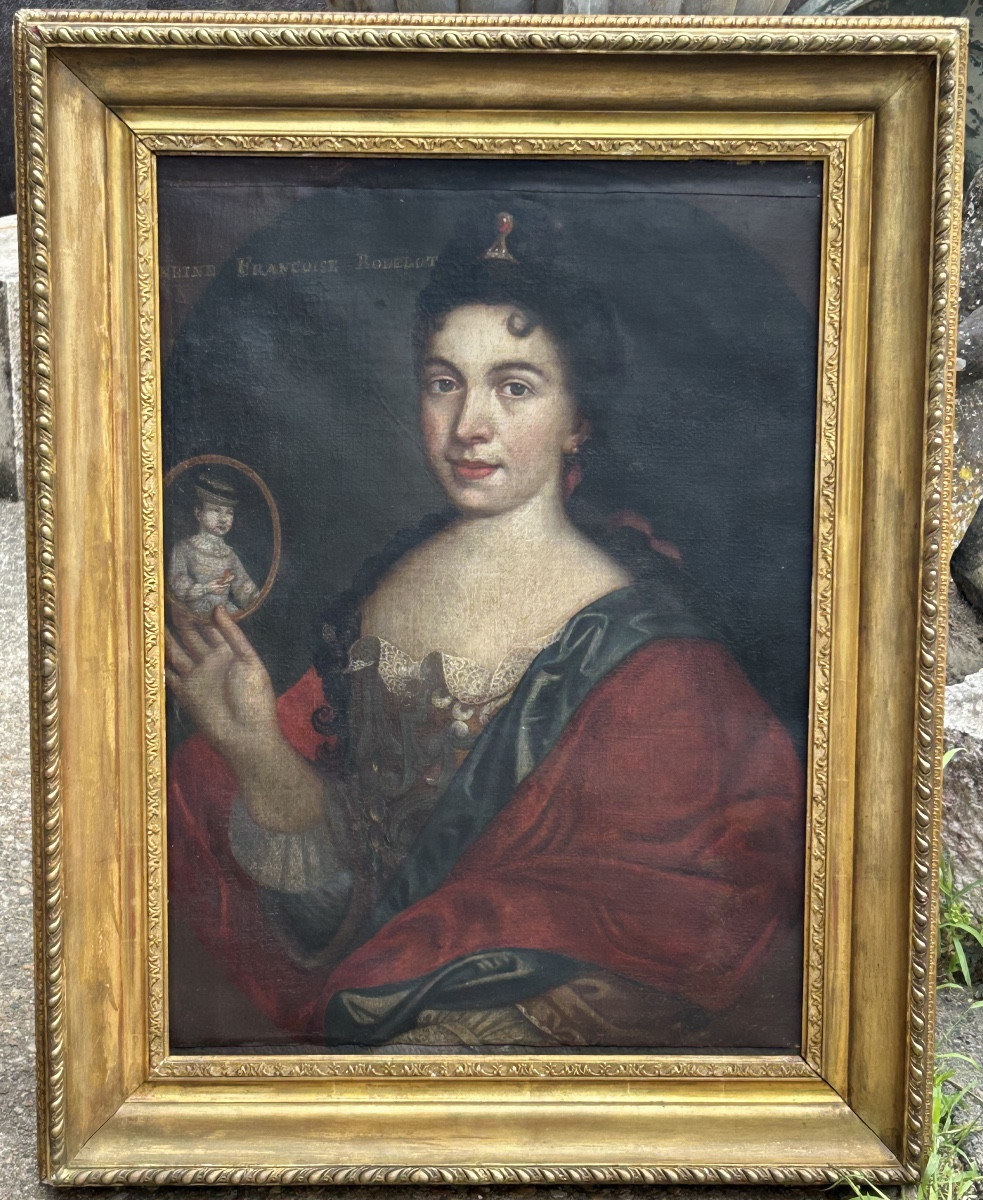 Portrait Of A Woman From The 17th Century Presenting A Miniature Of Her Child 