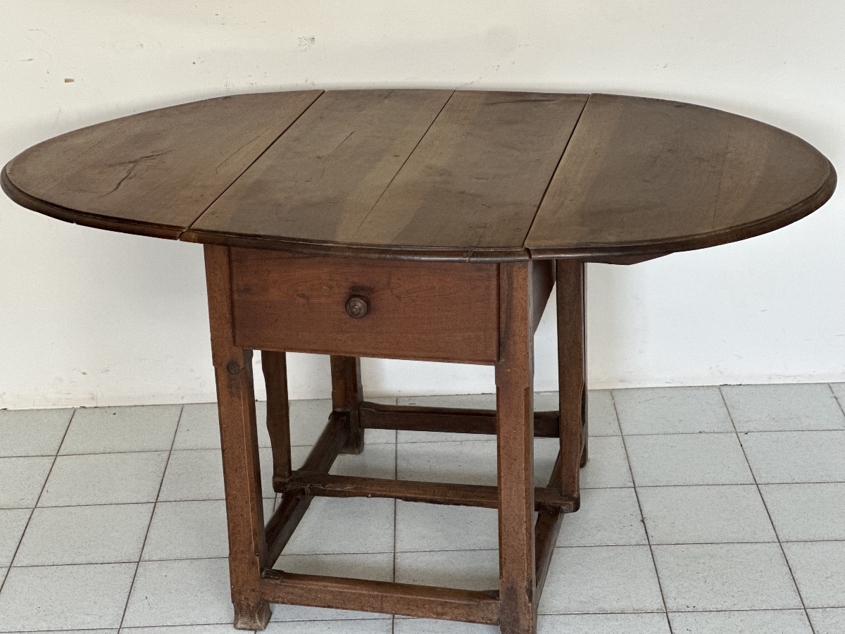 Walnut Hinged Table. 17th Century