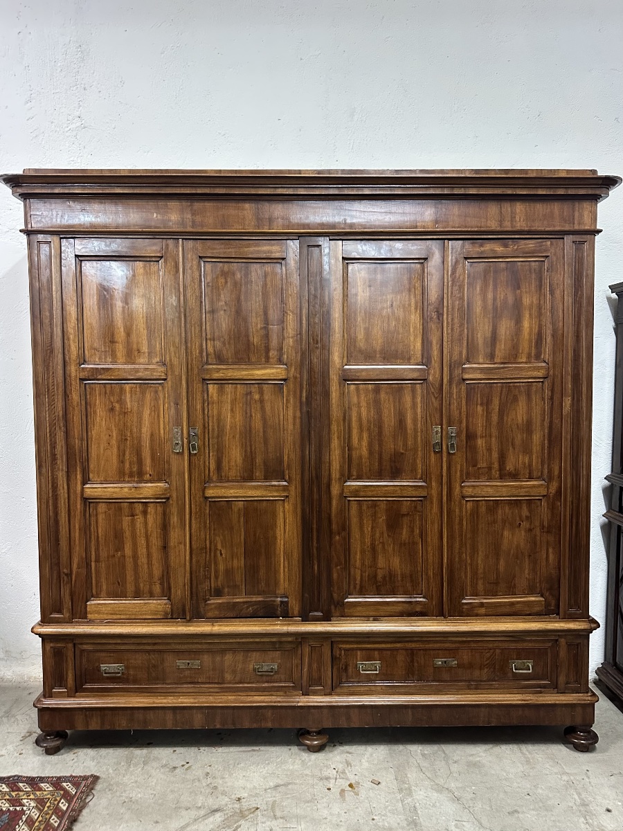 Four-door Lombard-style Carlo X Walnut Wardrobe. Milan, First Half Of The 19th Century