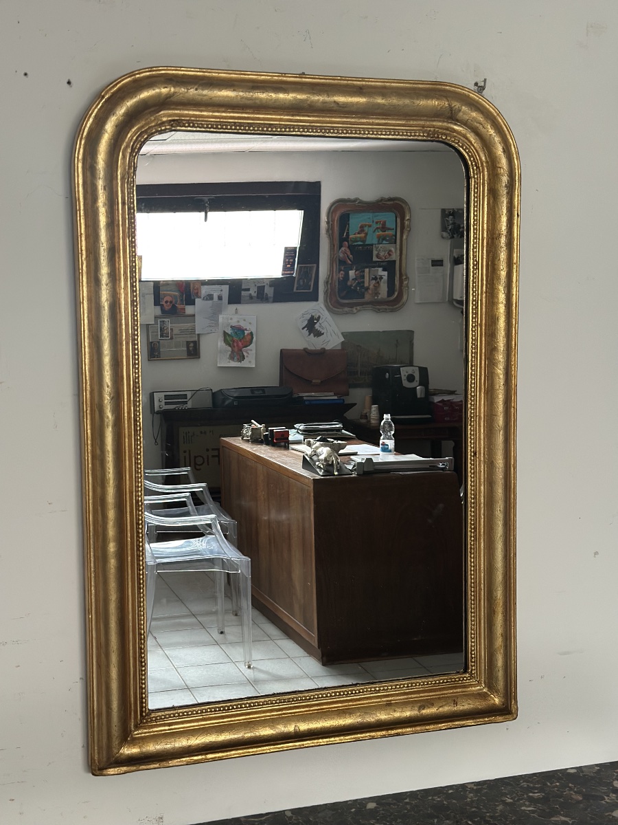 Miroir de la seconde moitié du XIXe siècle en bois doré. Forme rectangulaire à angles arrondis.-photo-2