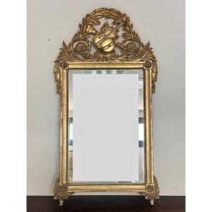 Miroir en bois sculpté et doré. Époque Empire toscane, première moitié du XIXe siècle.