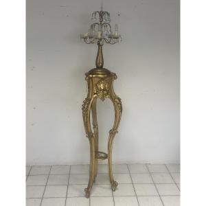 Lampadaire en bois sculpté et doré. Lombardie, XIXe siècle.