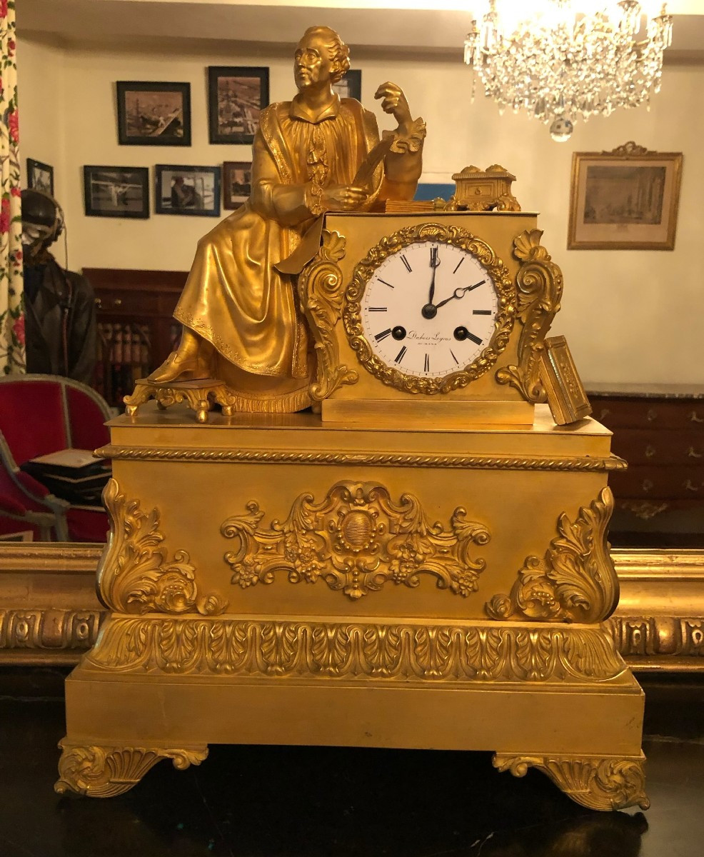 pendule bronze dorée epoque restauration "Montesquieu"