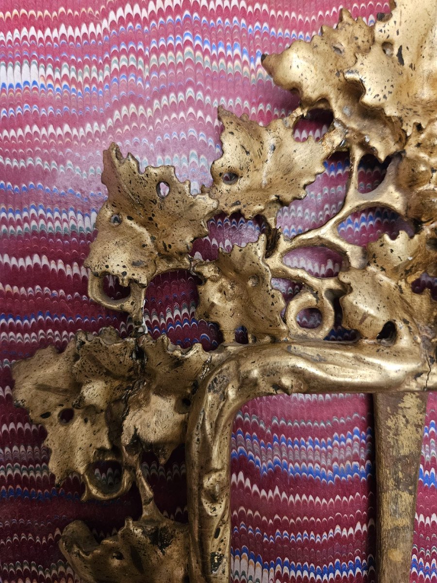 Wooden Frame Carved With Vine Leaves And A Bunch Of Grapes, Gilded With Gold-photo-1