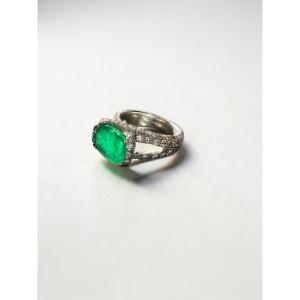Bague de haute joaillerie en or blanc 18 carats, émeraude et diamants 
