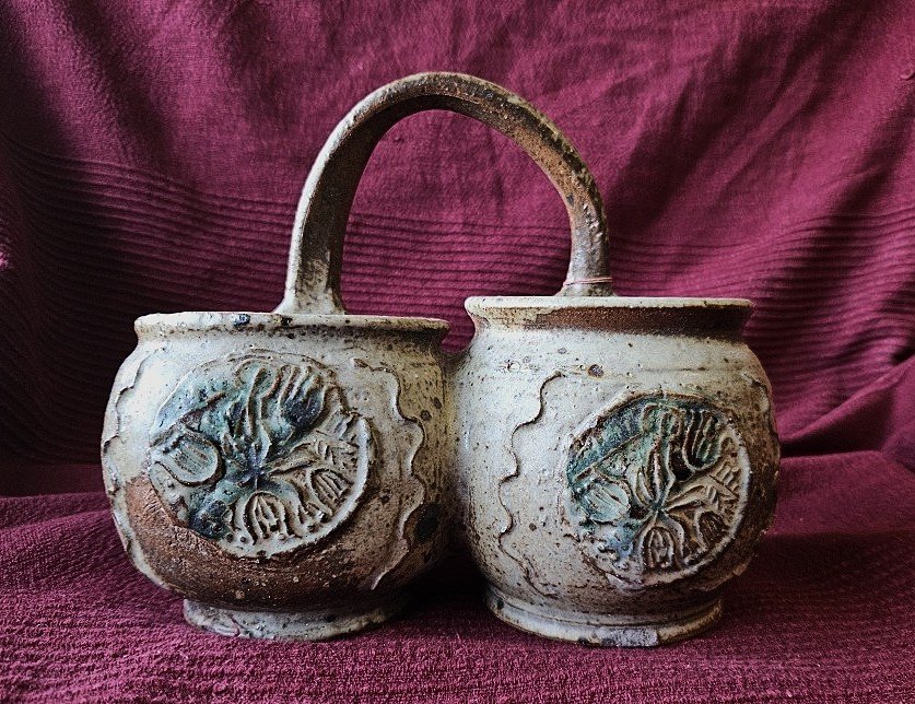 Ceramics / Two Pots Connected By A Handle.