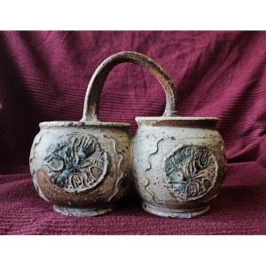 Ceramics / Two Pots Connected By A Handle.