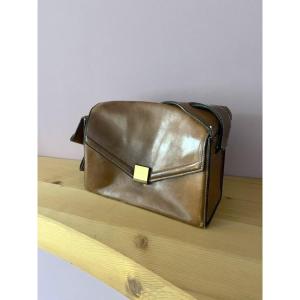 A Brown Leather Hermès Bag With A Very Original Design And Original Logo. Circa 1950.