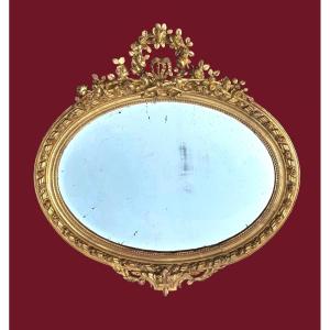Miroir ovale bois doré 19ème siècle de style Louis XVI