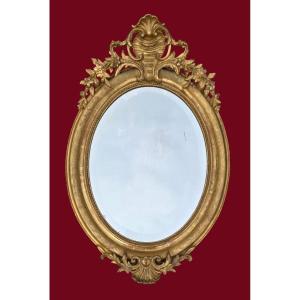 Miroir ovale bois doré 19ème siècle de style Louis XV