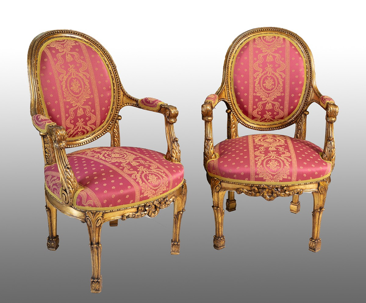 Paire de fauteuils anciens français de style Napoléon III, en bois doré et sculpté. XIXe siècle