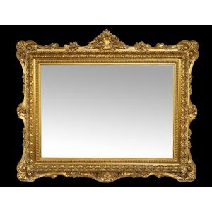 Miroir romain ancien en bois doré et sculpté, datant de la première moitié du XIXe siècle.