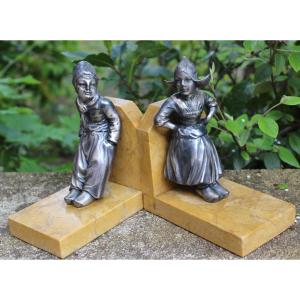 Bookends Evoking A Folkloric Couple In Zamak Which Is A Zinc-based Alloy