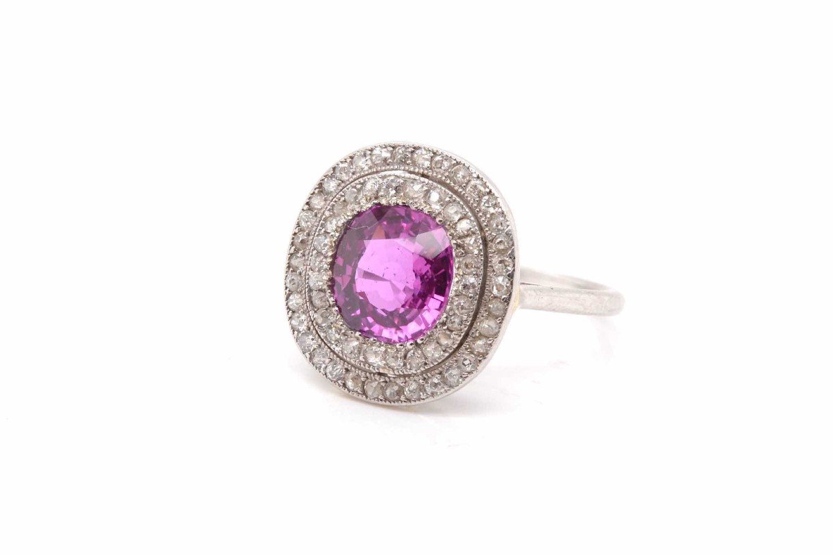 Old Ring Set With A Pink Sapphire And Diamonds