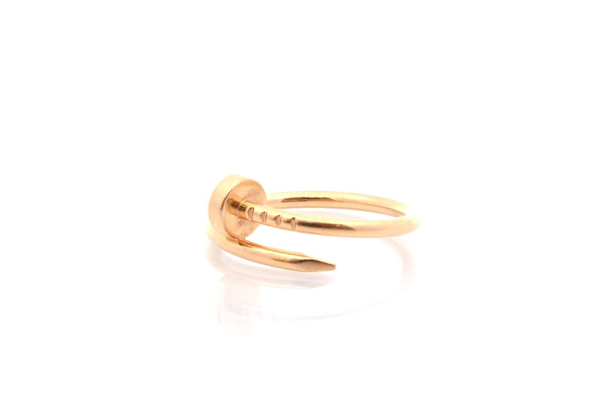 Bague signée Cartier clou or 18k