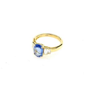 Oval Sapphire And Baguette Ring In 18k Yellow Gold