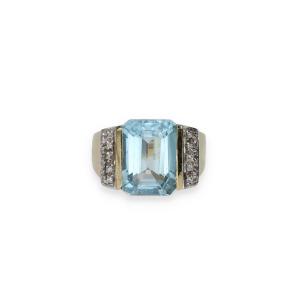 Blue Topaz And Diamond Ring
