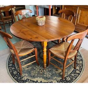table ronde à volets en merisier