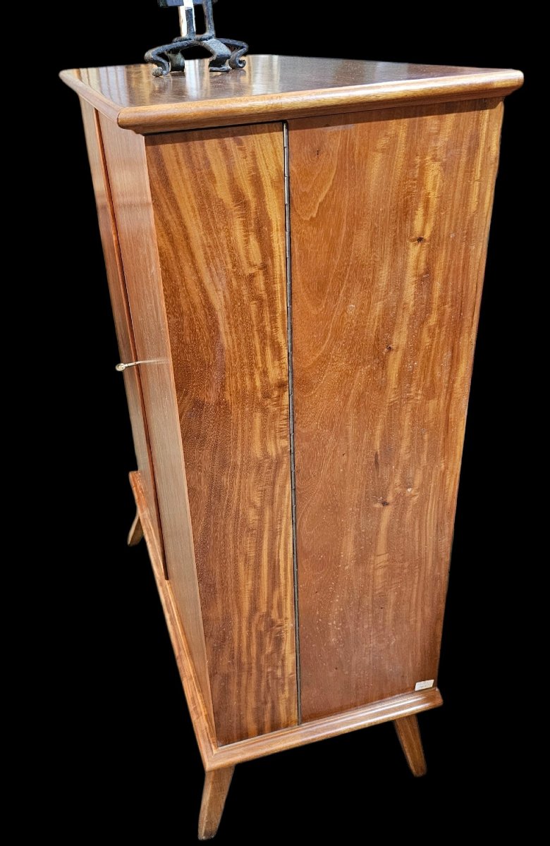 A Fold-away Desk Inside A Cabinet Known As A -photo-5