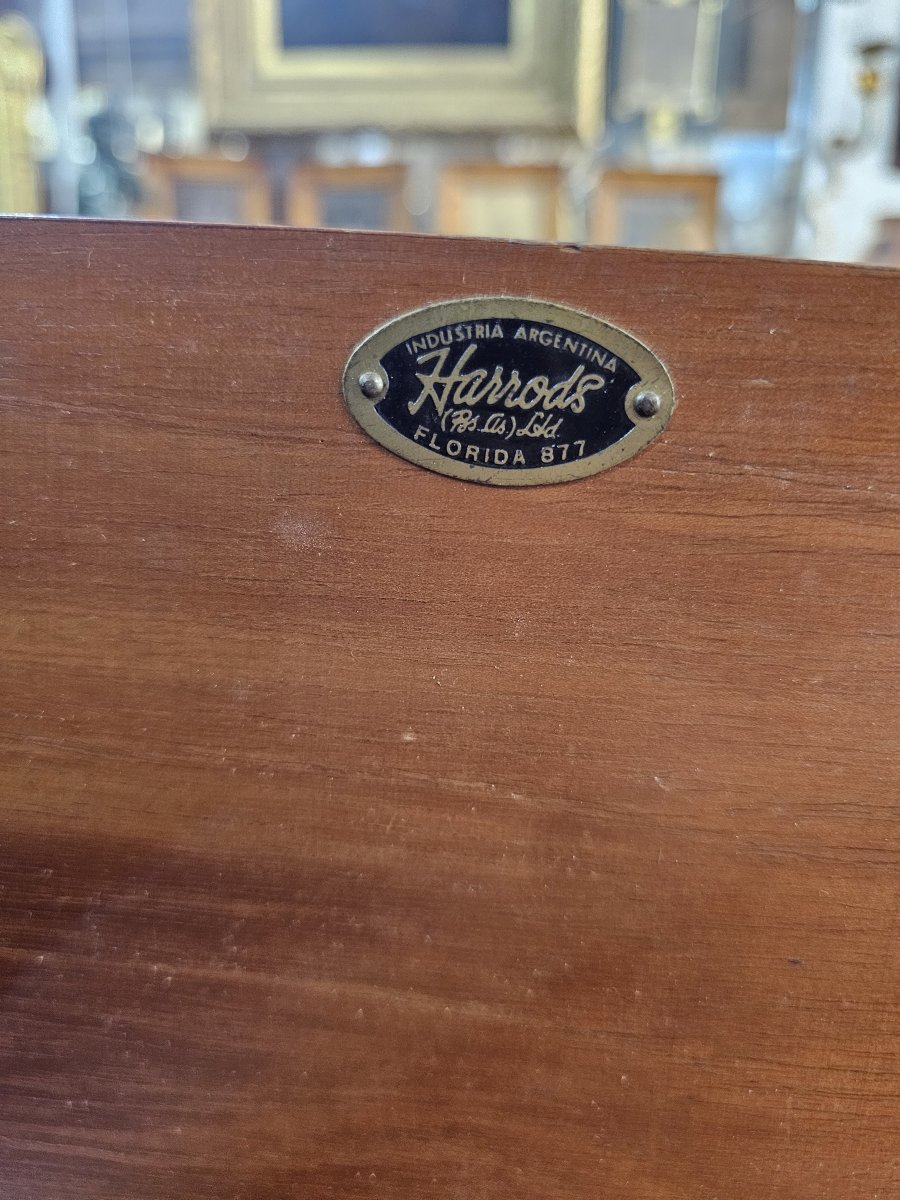 A Fold-away Desk Inside A Cabinet Known As A -photo-7