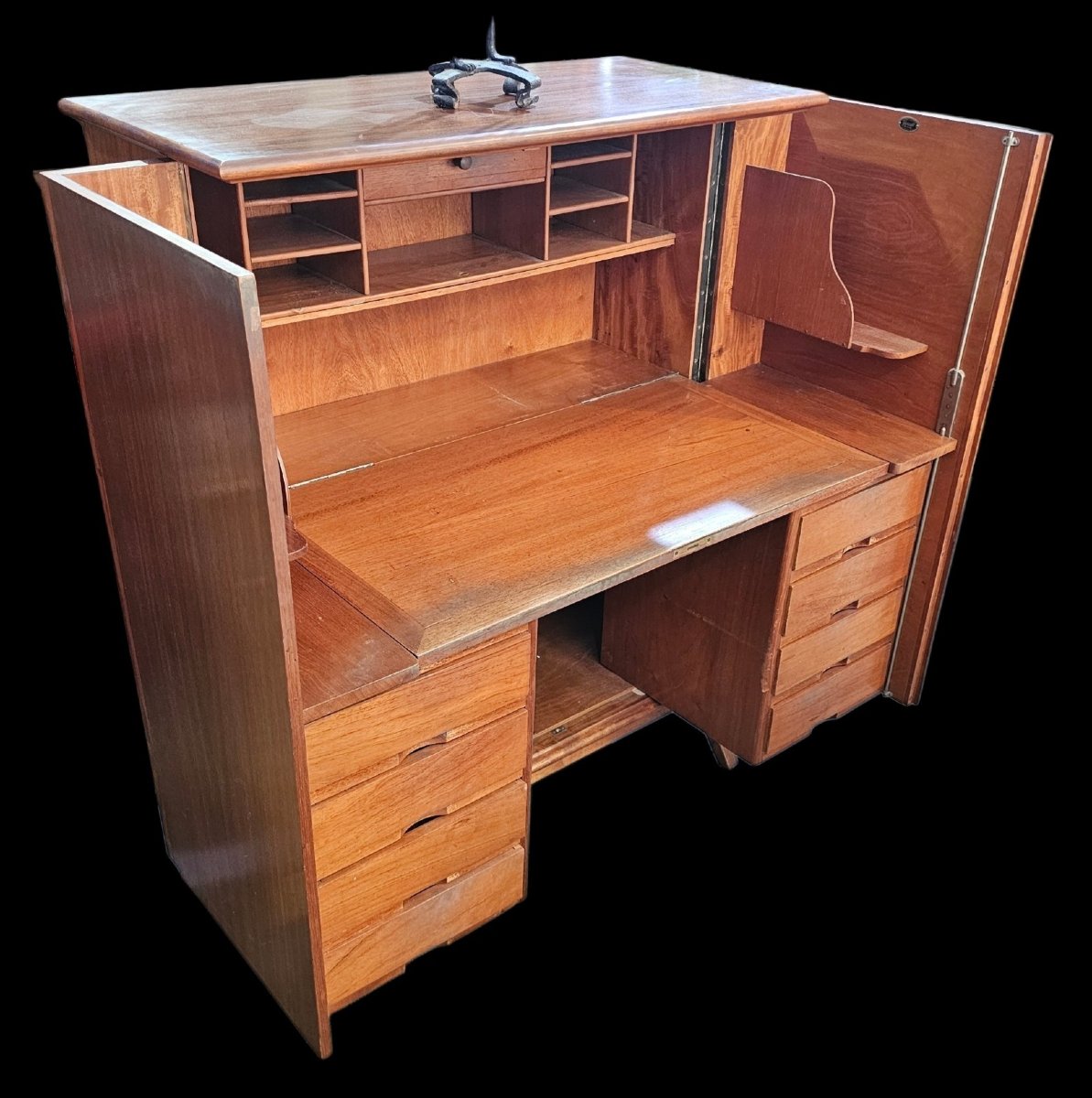 A Fold-away Desk Inside A Cabinet Known As A 