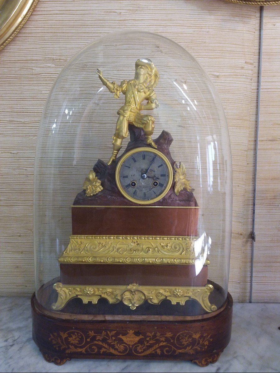 Restoration Clock In Gilt Bronze And Patinated Under Globe