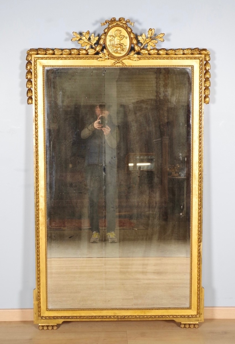 Miroir doré style Louis XVI