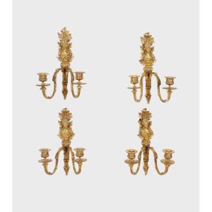 Four Louis XVI Style Gilt Bronze Wall Lights
